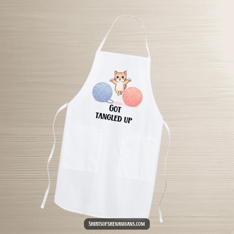 Funny cat apron, mid-leap between yarn balls, ready for kitchen adventures with playful grace. A fun funny gift.