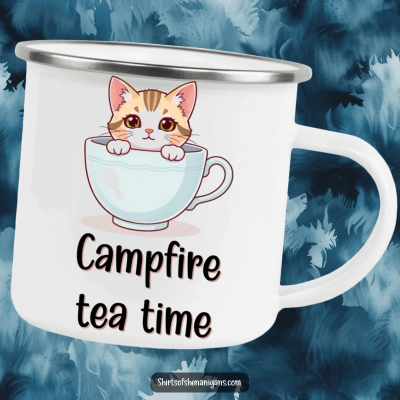 Funny cat camping mug, curious feline peeking from a giant teacup, ready for outdoor relaxation. A rugged funny gift.