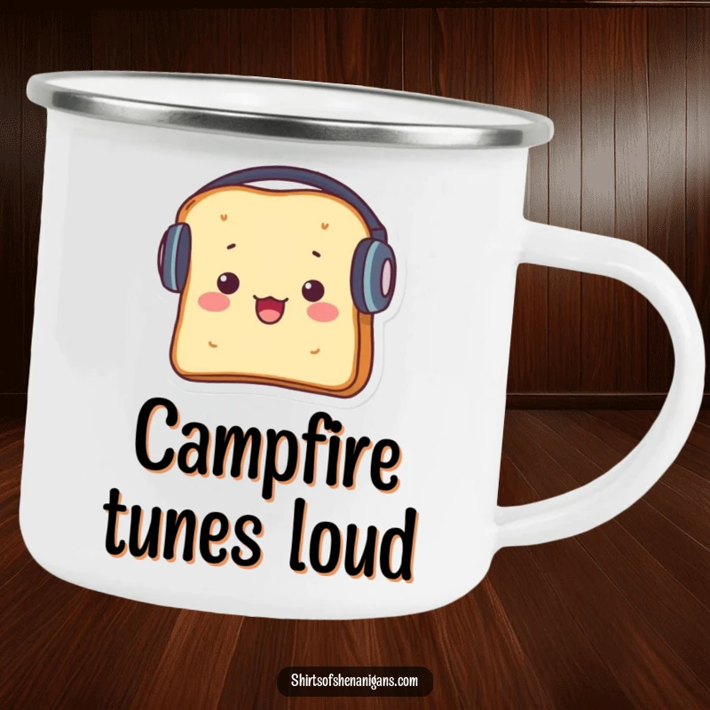 Funny camping mug with a startled piece of toast wearing large headphones, ready for outdoor jams.