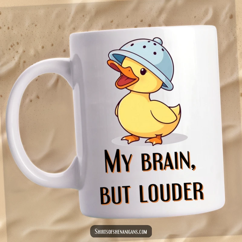 Funny mug: A duck wearing a colander as a hat, quacking loudly with a comical expression, spreading joy.