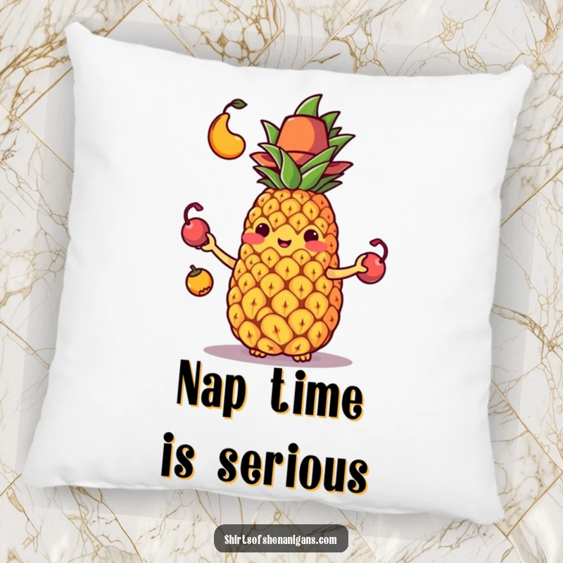 Funny pillow with a soft texture, showing a juggling pineapple in a small hat comically losing its fruit.