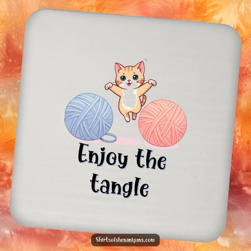 Funny cat coaster, mid-leap between yarn balls, adding playful feline charm. A cute and funny gift.