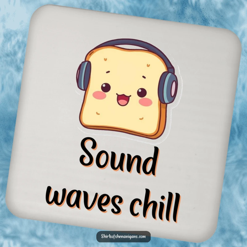 Funny drink coaster with a startled piece of toast wearing huge headphones, a musical table accessory.