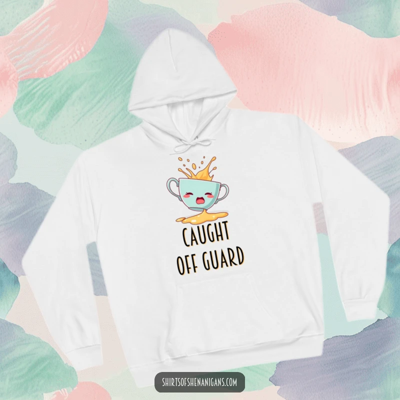 Funny hoodie featuring a startled teacup dramatically spilling its contents, a comical scene.