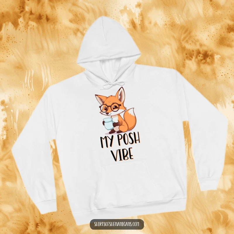 Funny fox hoodie featuring a monocled fox dramatically sipping tea, perfect for warm, sophisticated, and humorous comfort.