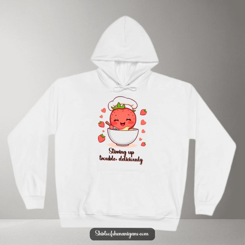 Funny Strawberry Chef Hoodie: A cheerful strawberry character mixing batter in a bowl, designed for cozy laughter.