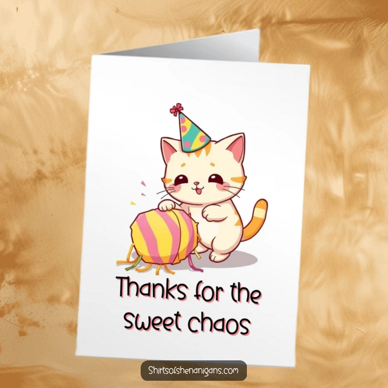 Funny free printable thank you card depicting a cat in a party hat accidentally toppling a piñata, humorously thanking them.