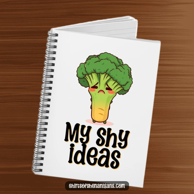 Funny embarrassed broccoli hiding behind a carrot on a notebook cover, perfect for jotting down notes with humor.