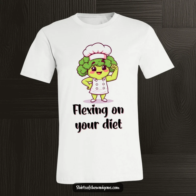 Funny Broccoli Chef T-Shirt: Proud cartoon broccoli flexing a tiny muscle, wearing a chef hat.