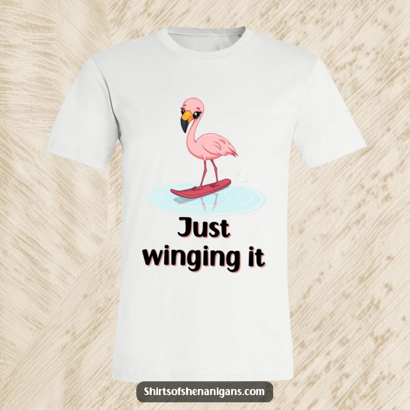 Funny startled flamingo t-shirt, cross-eyed while attempting water skiing on a puddle, showcasing comical failure.