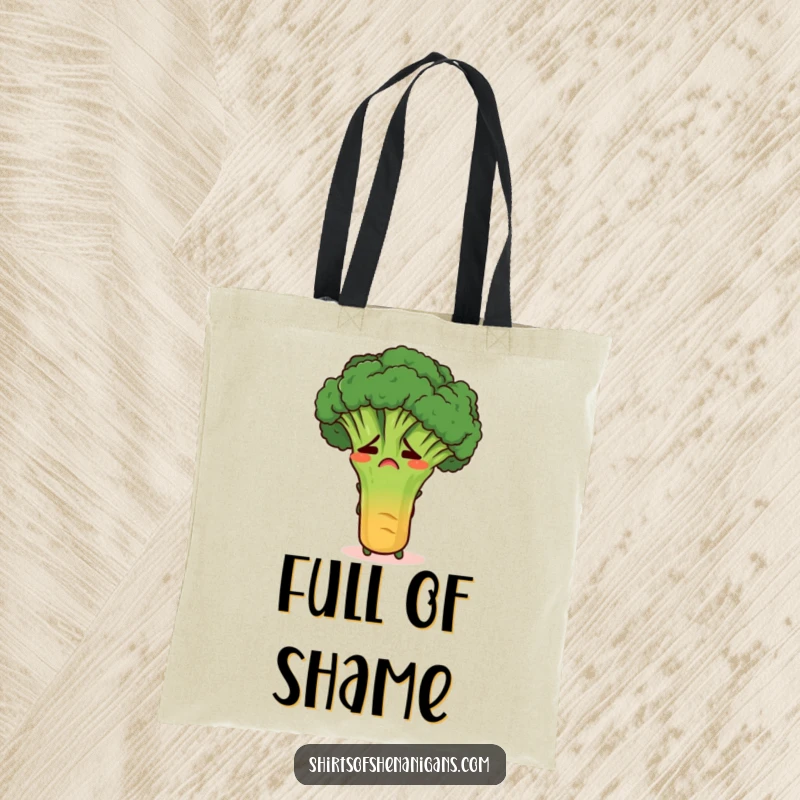 Funny embarrassed broccoli hiding behind a carrot on a durable tote bag, ideal for humorous grocery shopping.